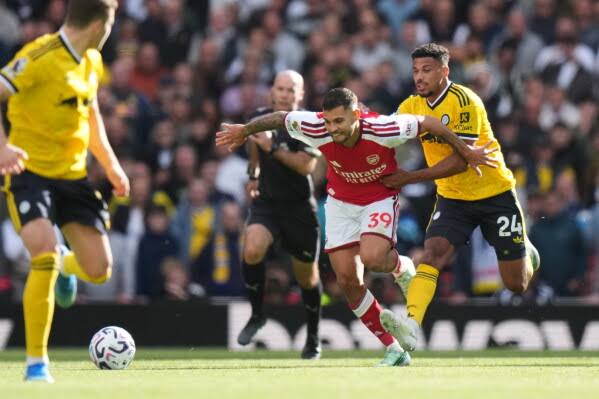 Guimaraes’ Winner Helps Arsenal Fight Back to Beat Leeds 2-1