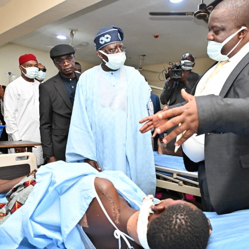 President Bola Ahmed Tinubu and Benue State Governor, Hyacinth Alia with the victims of herdsmen attack at the hospital as president visit to Benue State on Wednesday. Photo: State House.