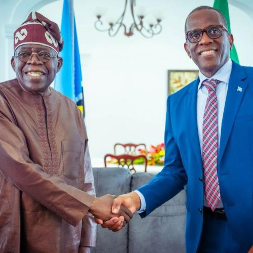 President Bola Tinubu and Prime Minister Philip J. Pierre, at the official residence of the Prime Minister
